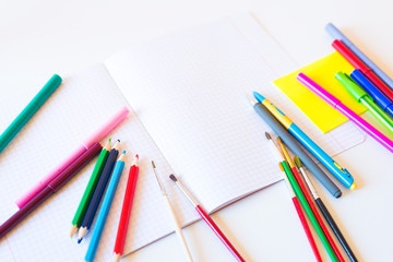 pencils markers stationery for schooling on the table