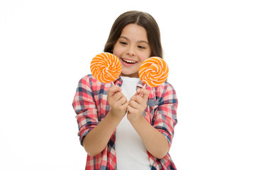 Hard choice. Girl hold two lollipops in hands isolated white. Girl can not decide which lollipop she want. Sweets addicted kid. Which one alternative decision. Make your choice. Pick one lollipop