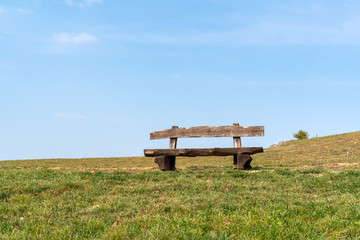 Empty wooden park bench