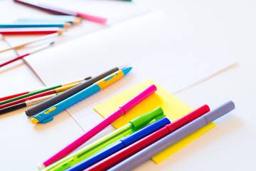 pencils markers stationery for schooling on the table