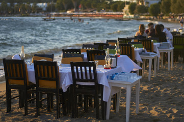 Cafe near the seashore. The coast of the Aegean Sea. Turgusreis, Bodrum, Turkey