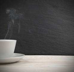 Mockup with white cup of coffee and steam