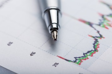 office document with a pen