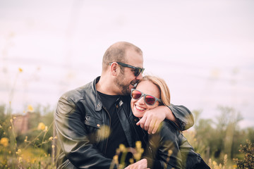 Cute Couple kissing in the field