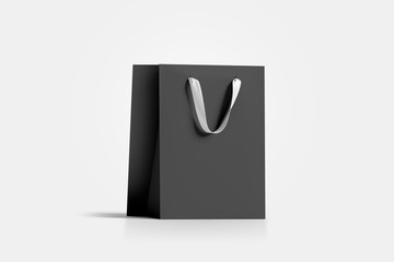 Blank black paper gift bag with white silk handle mockup, 3d rendering. Empty craft carry packet mock up, isolated. Clean shop bagful, side view. Beautiful package for present and shopping - Powered by Adobe