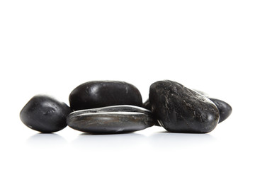 Beyaz arkaplanda siyah taşlar