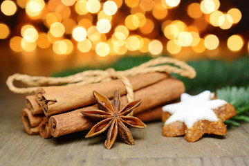 Cinnamon sticks as a spice for Christmas with fairy lights as decoration and lighting