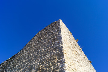Fototapeta na wymiar Torre in pietra di rocca varano a gagliole