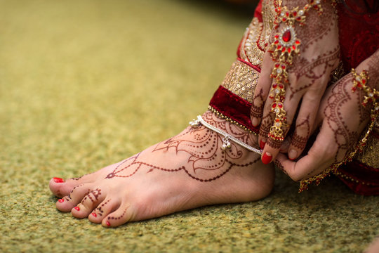 Indian Mehndi Painting On The Foot Feet Girls