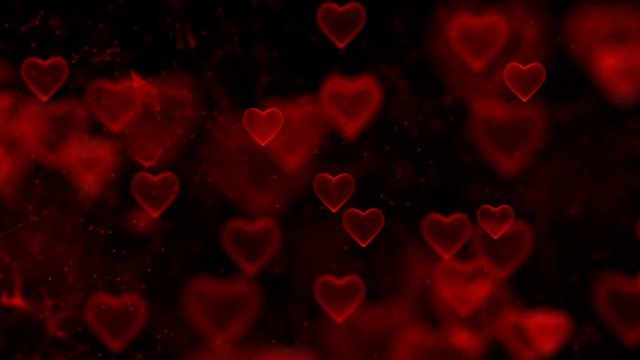 Interconnection of Hearts. The Day of the Holy Valentine. Background with hearts. Focusing and defocusing on three-dimensional images of hearts.