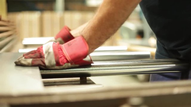 Hands working in industry with gloves