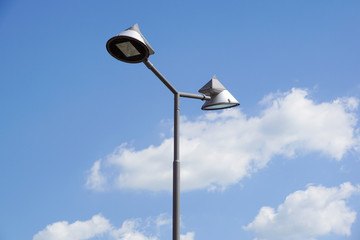 Poles led. Street light against the blue sky with clouds. copy space.