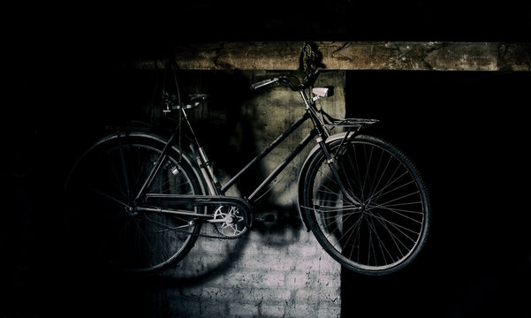 Retro vintage  bike on black and white wall.