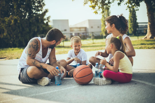 Family relaxation after good basketball game.