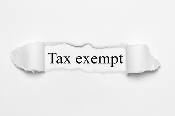 Tax exempt on white torn paper