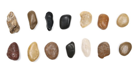 Fototapeta na wymiar Collection colorful, decorative pebbles, rocks isolated on white background, top view