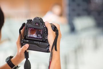 camera show viewfinder image catch model motion. catch feeling, stopped motion. camera DSLR...