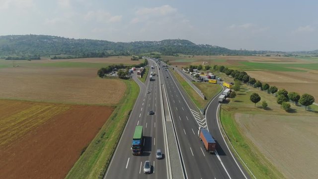 Cars on the Autobahn in Germany fast driving beautiful road