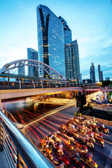 Obraz premium Bangkok,Thailand, - 24 July 2016 : Night time at Chong Nonsi skywalk Bangkok skytrain station (BTS) in Bangkok, Thailand. Chong Nonsi Station is a skytrain station at Bang Rak District. 