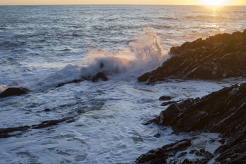 Obraz premium Mare mosso al tramonto