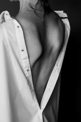 Female back in white male shirt