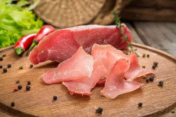 beef jerky and spice on old table
