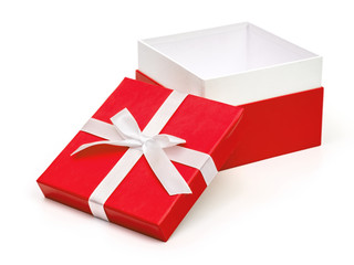 Open red box with a gift and white bow isolated