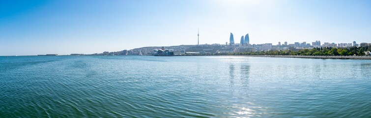 Baku, Azerbaijan - September 26, 2018. Baku Flame Towers is the tallest skyscraper in Baku. Panoramic view of skyline in Baku, Azerbaijan, with historic and modern architecture. Caspian Sea Panorama