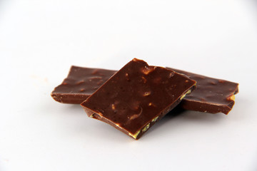 pieces of chocolate on white background