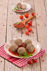 Meatballs with tomato sauce.