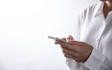 human hand using smartphone on white background