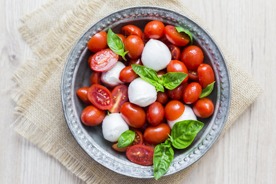 Italian food, caprese, mozzarella and tomatoes and basil
