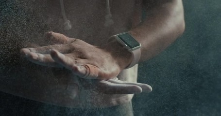 fitness woman athlete hands clapping chalk powder sportswoman preparing training workout in gym ready for bodybuilding strength exercise slow motion close up - Powered by Adobe