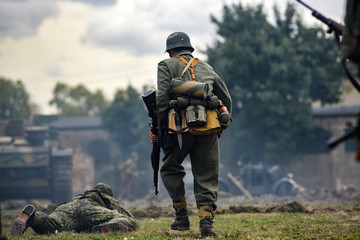 Historical reenactment of soldiers during the Second World War, view from the back
