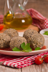 Meatballs with tomato sauce.
