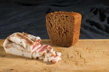 fresh bacon and rye bread natural foods for lunch a lot of protein and fat