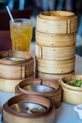 Chinese appetizer, Dimsum, streamed cuisine on bamboo basket container, traditional cuisine