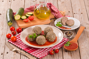 Meatballs with tomato sauce.