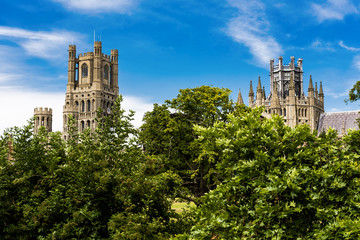 The beautiful Ely Cathedral, often know as 'the Ship of the Fens' because of its prominent position above the surrounding flat landscape towers over the streets of the picturesque city of Ely.