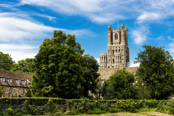 Fototapeta na wymiar The beautiful Ely Cathedral, often know as 'the Ship of the Fens' because of its prominent position above the surrounding flat landscape towers over the streets of the picturesque city of Ely.
