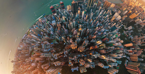 Little planet. Aerial view of Hong Kong Downtown. Financial district and business centers in smart...