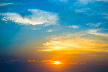 Fiery orange colorful sunset sky. Beautiful sky.Background of orange sky concept: Dramatic city sunset with twilight color sky and clouds.view of  with clouds in the evening