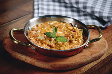 Traditional turkish food menemen made by eggs and tomatoes.