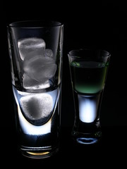 glass of water with ice on white background