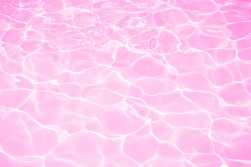 Beautiful pink water in swimming pool texture background