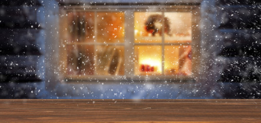 a festive wooden table by the window of a warm interior with free space for an advertising product  