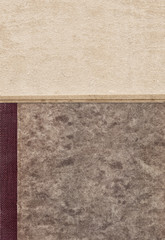 Fototapeta premium Vintage background with retro paper on old book cover
