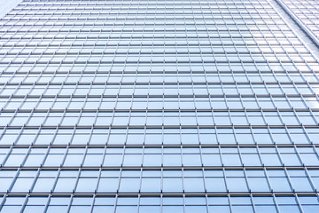 underside panoramic and perspective view to steel blue glass high rise building skyscrapers, business concept of successful industrial architecture