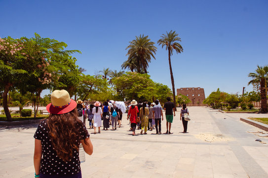  Colorful Travelers and Turists in Karnak Temple, Luxor, Egypt