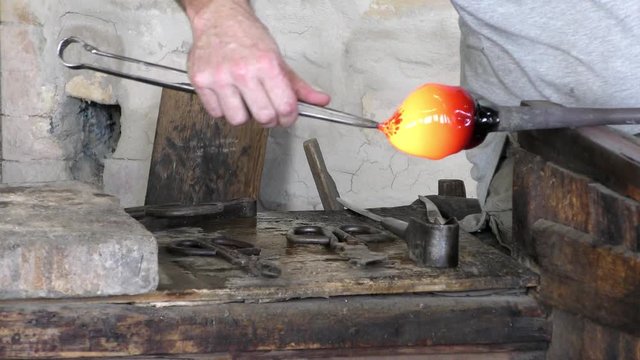 Making glass sculptures in Murano Italy, 4K video 
